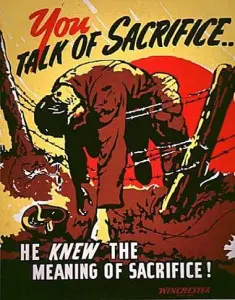 {Image is a World War II propaganda poster. A dead soldier lies across a barbed wire fence. The text reads, 